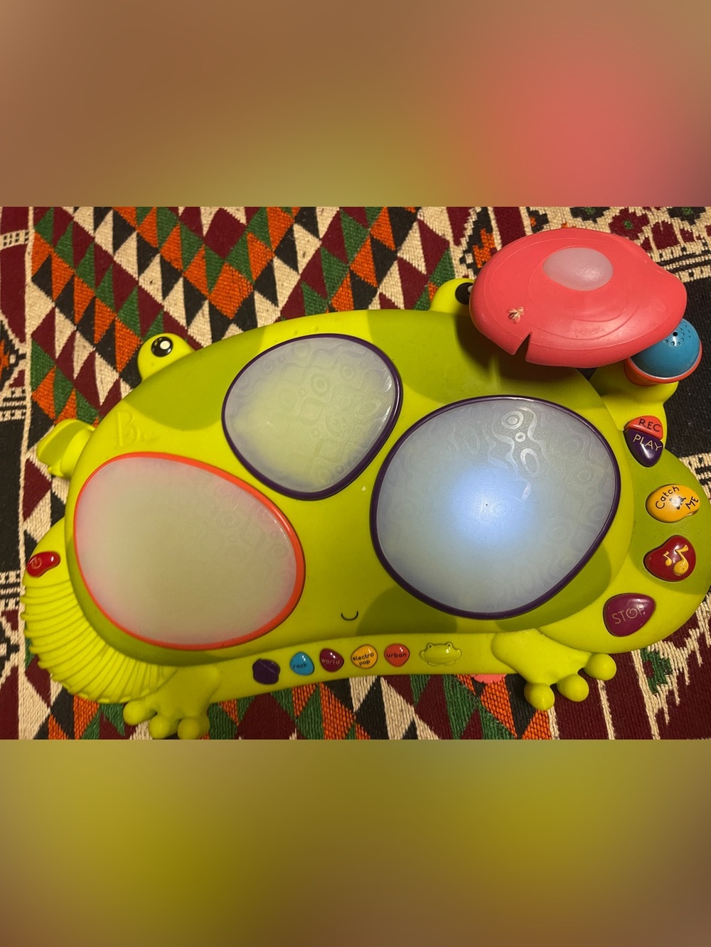 B. toys Frog Drum Ribbit-tat-tat